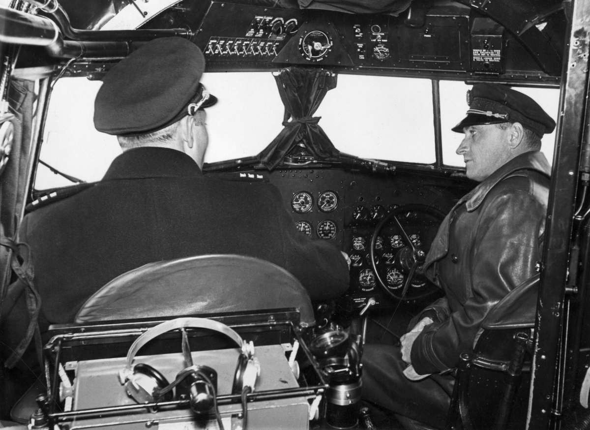  KLM Captain Koene Parmentier and First Officer Jan Moll in the cockpit of the 'Uiver' DC-2 