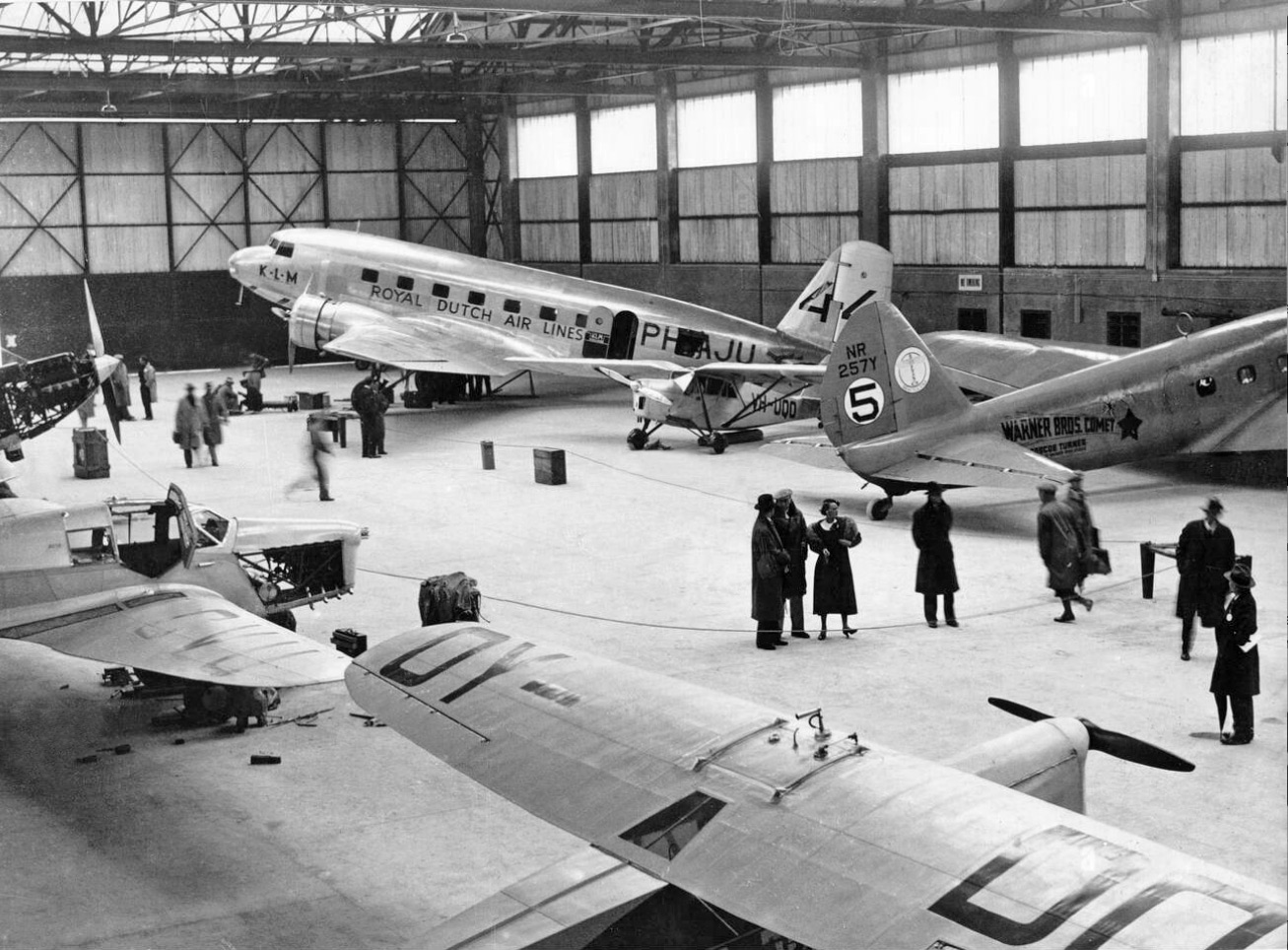  Competitor aircraft in the hangar at Mildenhall, Uiver in background 