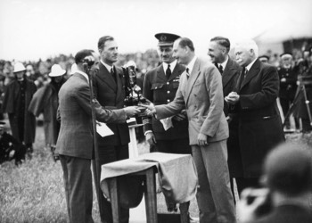  The Duke of Gloucester presents the winners trophy to Scott and Campbell Black at Flemington. Sir McPherson Roberston at right (State Library VIC) 