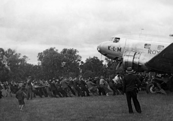  KLM 'Uiver' DC-2 being pulled from the mud at Albury Racecourse. First Officer Jan Moll in foreground 