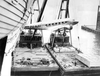  DC-2 (PH-AJU) being hoisted to the deck of the S.S. Statendam at New York, bound for the Netherlands 