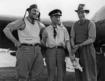  The crew of the Boeing 247D, pilot Roscoe Turner (L), radio operator Reeder Nichols (C), and co-pilot Clyde Pangborn (R) at Bourke, NSW (State Library QLD) 