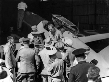  Scott and Campbell Black checking the fuel levels of their DH.88 at Charleville  (State Library QLD) 