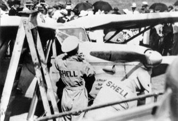  Jimmy Melrose's DH.80 Puss Moth being refueled at Charleville (State Library QLD) 