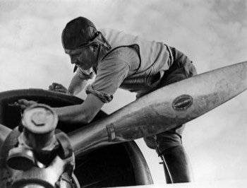  Pilot Roscoe Turner working one of the Boeing engines at Charleville (State Library of QLD) 